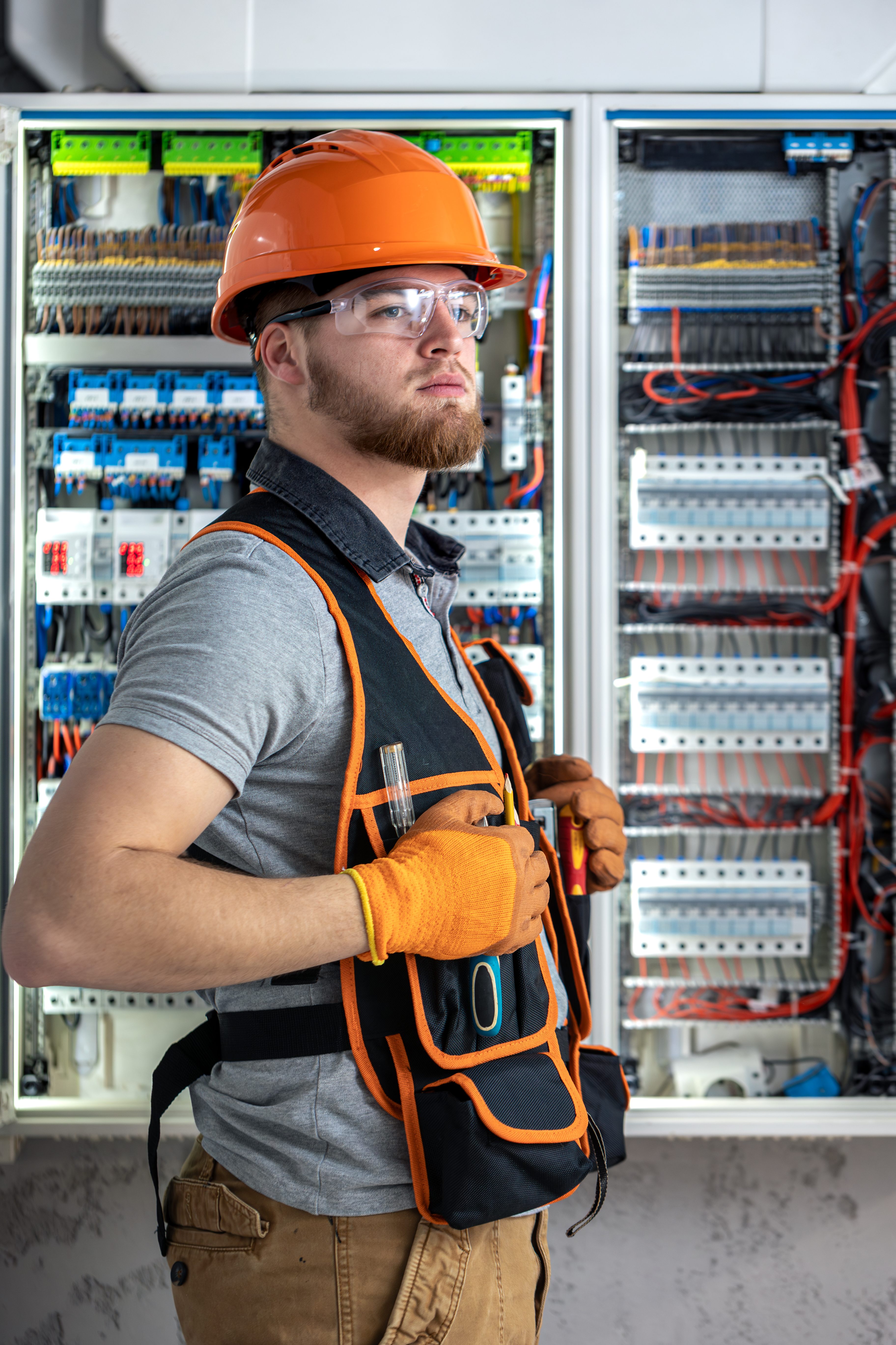 electrician-man-overalls-works-switchboard-portrait-electrician-overalls (1).jpg